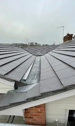 The roof of a house that has been gutted.