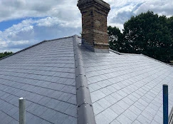 A chimney on the roof of a building.