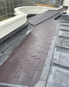 The roof of a building that has been gutted.
